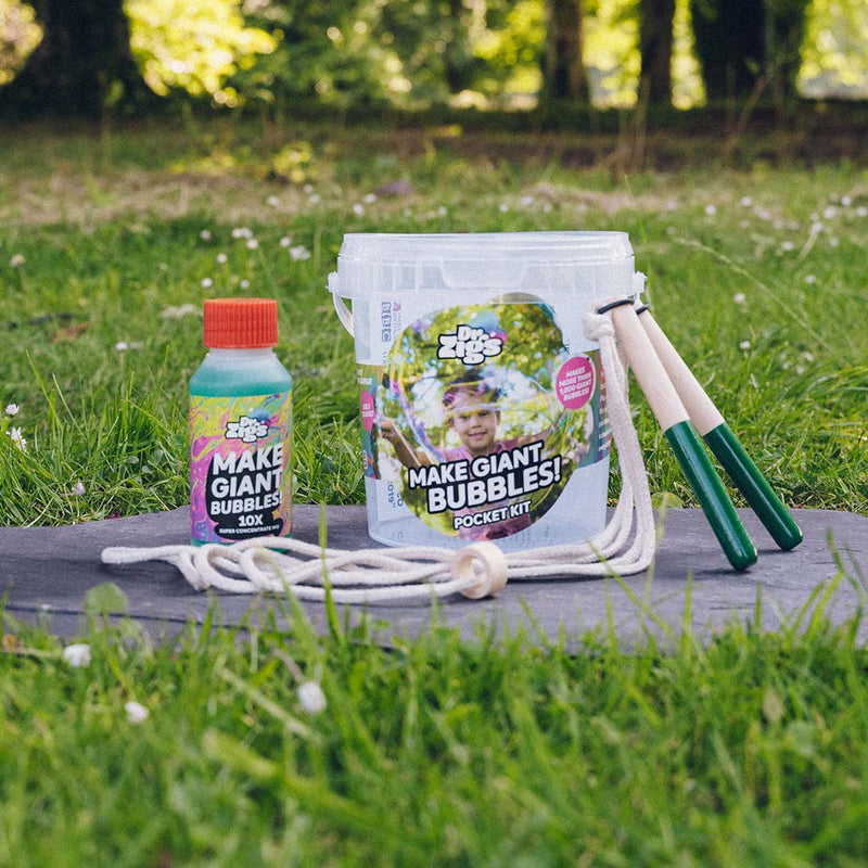 Dr Zigs bubble mix bottles and bubble tools outdoors